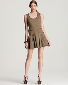 A full pleated mini skirt swings from a paneled waist on this See By Chloé sleeveless dress, creating a fun and flirty look to take you from day into evening in charming style.