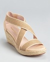 In natural jute and linen, these Taryn Rose sandals make a statement of neutral hues.