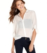 Flourished in rhinestones and sporting a cool high-low hem, this three-quarter sleeve blouse from Ali & Kris is a glam update to the popular sheer button-down!