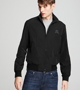 This slick-meets-sporty bomber jacket from Burberry Brit lends an effortless layer to transitional seasons.