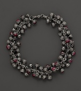 Inspired by Zen philosophy, this intricately detailed sterling silver bracelet from Paul Morelli softly jingles with meditation bells and cabochons of pink rhodalite.