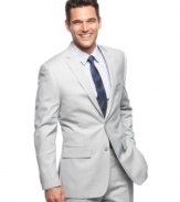 Update your dresswear collection with the modern cut of this slim-fit gray blazer from Alfani RED.