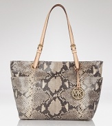 Give your look a luxe, exotic finish with this python-embossed leather tote from the master of chic: MICHAEL Michael Kors.