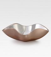 An elegant, undulating form handcrafted of metal alloy with a glowing copper plated exterior.Metal alloy and copperplateHandmadeSigned by designer Wei Young16L X 11W X 3.5HHand washImported