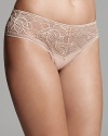 Natori's thong features a wide floral-lace waistband and mesh body for luxe comfort. Style #750047.