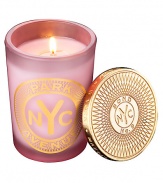 From a uniquely New York collection of scents, this feminine, floral-scented candle pervades the air with elegance.  · Paperwhite, iris, rose, with soothing chamomile  · Made of the finest wax and wicks  · In sturdy, tinted glass container  · Gilt metal cap keeps scent from fading  · Burn time, approx. 60 hours 