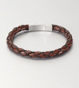 Braided brown Italian leather band with sterling silver clasp. Tension-held box clasp About 8½ long Embossed signature Made in United Kingdom