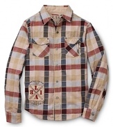 An updated take on classic plaid, this casual GUESS Kids button-down features a front logo and an edgy-cool zip pocket.