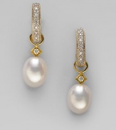 Lustrous white freshwater pearls, with dazzling diamond accents, are ready to hang from your favorite hoops. Diamonds, 0.03 tcw White freshwater pearls 18k yellow gold Drop, about ¾ Spring ring clasp Imported Please note: Earrings sold separately.