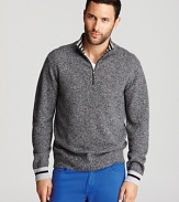 A soft, marled cashmere sweater keeps you warm whether you're outside building a snowman or sipping cocoa by the fire.
