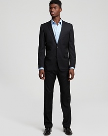Suitable for the boardroom and the best man, this pinstripe suit in lightweight virgin wool is a wardrobe staple. Fully lined jacket has notched lapel, front flap pockets and 2-button closure. Pant has flat front, black slit pockets and zip fly. Suitable for the boardroom and the best man, this pinstripe suit in lightweight virgin wool is a wardrobe staple. Fully lined jacket has notched lapel, front flap pockets and 2-button closure. Pant has flat front, black slit pockets and zip fly.