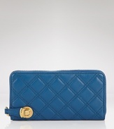 Marc Jacobs proves practical accessories can make a personal statement. A well-organized option for this well-dressed femme, this wallet makes stylish work of the day-to-day tasks.
