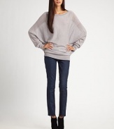 Sophisticated boatneck with soft, semi-sheer dolman sleeves and a secure banded hem. BoatneckLong dolman sleevesBanded cuffs and hem51% wool/34% cotton/15% linenDry cleanImportedModel shown is 5'10 (177cm) wearing US size 4.