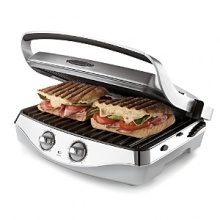 The Calphalon electric grill cooks chops, chicken and fish in a snap, all without the fat. Extra large surface fits up to four paninis at a time. Features removable grill plate with adjustable height, time and temperature controls. The Calphalon electric grill cooks chops, chicken and fish in a snap, all without the fat. Extra large surface fits up to four paninis at a time. Features removable grill plate with adjustable height, time and temperature controls.