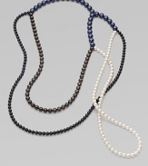 From the Night Blue Collection. This versatile piece features multi-colored strands of pearlized glass beads in an artfully asymmetrical style. Length, about 56½ Slip-on style Imported 