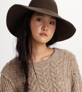 Make a striking silhouette in this wide-brimmed wool design.Wool Spot clean Made in USA