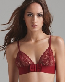 Master the pin-up girl look in this retro-inspired bralette with sheer floral lace cups and large bow accent at front.