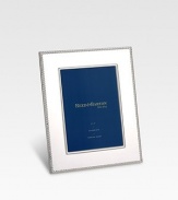Elegant silverplate design with a beaded border and a mirror-bright shine. Outside 8¼ X 6¼ Holds 4 x 6 photo Imported