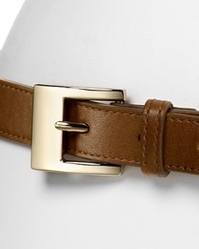 Two-way turnlocks allow you to swap smooth for snake print leather for chic, versatile style. By Cole Haan. Two-way turnlocks allow you to swap smooth for snake print leather for chic, versatile style. By Cole Haan.