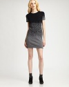 Soft, wool-rich sweaterdress has a contrasting leopard pattern that creates a trend-savvy, ombré effect. RoundneckShort sleevesAbout 21 from natural waist52% wool/48% acrylicDry cleanMade in USA of imported fabricModel shown is 5'11 (178cm) wearing US size Small.