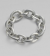 From the Chain Collection. Alternating cable and plain oval links with an integrated clasp closure.Sterling silver Length, about 8¾ Hidden clasp closure Imported 