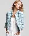 Tweed goes luxe with this double take-worthy Tory Burch jacket, featuring glimmering bead-embellished and fringe trim.