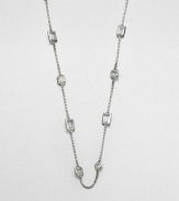 From the Cocktail Collection. Long enough to double or even triple, this stunning yet simple design combines a versatile chain with faceted shapes of clear glass stationed here and there. GlassSilvertoneLength, about 50Imported