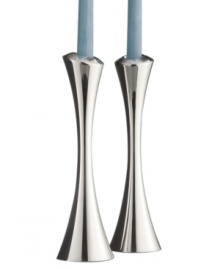 Named for Zeus' intrepid eagle, Aquila candlesticks possess a quiet power and strength. Distinguished by a gently turning spiral and clean lines crafted in Nambé alloy, this statuesque pair illuminates your table with modern grace. Designed by award-winning designer Lou Henry. Named for Zeus' intrepid eagle, Aquila candlesticks possess a quiet power and strength. Distinguished by a gently turning spiral and clean lines crafted in Nambé alloy, this statuesque pair illuminates your table with modern grace. Designed by award-winning designer Lou Henry.