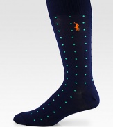 A dynamic dot-print pattern in a bold hue woven in soft, breathable stretch cotton.Mid-calf height57% cotton/37% nylon/3% rubber/2% spandex/1% other fibersMachine washImported