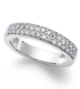 Sweet, stackable sparkle. Round-cut white diamonds (1/2 ct. t.w.) adorn the surface of this chic ring. Set in sterling silver. Size 7.