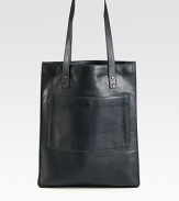 Sleek, supple leather tote designed to carry your tech essentials and more.Double shoulder straps, 11 dropTop zip closureOutside snap pocketInside zip pocketThree tech compartmentsFabric & leather lining13.25W X 16.25H X 3DImported