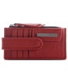 Petite and pretty, this python print design from Kenneth Cole Reaction holds all the essentials and adds a dash of instant edginess to your look. Plenty of compartments for cards, money, ID and a few extras, it discretely slips into a pocket or purse.