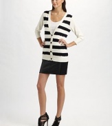 A luxe blend of cotton and cashmere, finished with bold, sequined stripes.V neckline Three-quarter sleeves Button-front placket Ribbed trim 85% cotton/15% cashmere Dry clean Imported