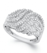 Subtly sparkling and precisely detailed, this elegant ring is boldly dramatic yet timeless. Crafted in sterling silver with round and baguette-cut diamonds (1 ct. t.w.). Size 7.