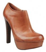 It takes two! Both shoe and bootie silhouettes combine stylishly on Steve Madden's Belbotm shooties. Crafted in leather with a high covered heel, the exaggerated platform gives them a chic retro '70s-era vibe.
