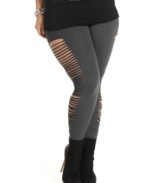 Rock an edgy look with ING's plus size leggings, featuring ripped sides.