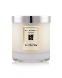 Instantly awakening the senses, Grapefruit is a lively, uplifting citrus with a spicy heart. Grapefruit and tangerine are combined with vetiver and rosemary to create this outspoken citrus scent. The Grapefruit Home Candle infuses any room with evocative scent and lasts for hours. An everyday luxury, it brings warmth to any environment. 200g. Instantly awakening the senses, Grapefruit is a lively, uplifting citrus with a spicy heart. Grapefruit and tangerine are combined with vetiver and rosemary to create this outspoken citrus scent. The Grapefruit Home Candle infuses any room with evocative scent and lasts for hours. An everyday luxury, it brings warmth to any environment. 200g.