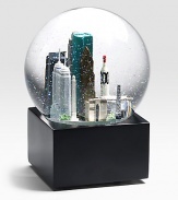 EXCLUSIVELY OURS. The musical Houston globe showcases landmark sites including:  NASA, the financial building, San Jacinto monument, Williams Tower and more.  Plays Deep In The Heart of Texas.  6 high.  Imported Glass globe, resin figures.