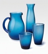 A mouthblown double old-fashioned glass weds modern design with classic style thanks to a gentle, wrap-around texture. From the Twirl CollectionGlass4H X 3½ diam.Dishwasher safeImported 
