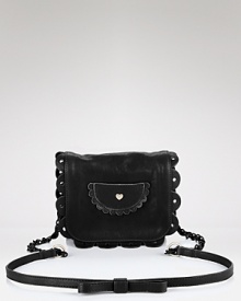 Tap into See by Chloé's whimsical brand of cool with the label's purple leather crossbody. With girlie ruffled detailing and a quirky-cute hue, this style adds a dose of off-beat chic. Tap into See by Chloé's whimsical brand of cool with the label's purple leather crossbody. With girlie ruffled detailing and a quirky-cute hue, this style adds a dose of off-beat chic.