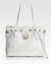 Stash your essentials in this roomy silhouette crafted in glittering suede for a touch of glam.Shoulder strap, 8½ drop Buckled flap and zip closure Protective metal feet One inside zip pocket One inside open pocket Cotton lining 13¾W X 9¾H X 8D Made in Italy