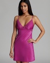 Accentuate your best assets in this vibrant Calvin Klein chemise with intricate lace detailing.