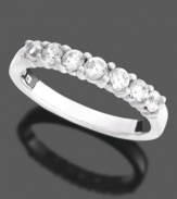 Timeless style for a timeless love. 14k white gold anniversary ring features seven, round-cut diamonds (1/2 ct. t.w.).