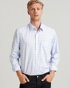Gingham is the season's go-to pattern. We love the way this slim fit shirt looks layered under your sport coat or chunky sweater.