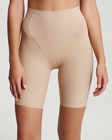 This long leg panty features a clean look and a slenderizing control panel. This long leg panty features a clean look and a slenderizing control panel.