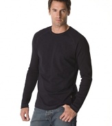 Long sleeved raglan tee with ribbed sleeves and side panels. Crew neck.
