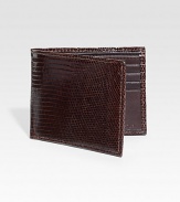EXCURSIVELY OURS.An elegant menswear standard is crafted in genuine lizard. One bill compartmentEight card slots4½ X 3½Imported