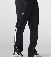 Hit the pavement in a lightweight stretch jersey pant that guarantees a stylish performance with air-tight pockets and reflective graphics.