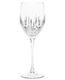 Set a table with enduring appeal. This classically elegant wine glass features intricately cut facets and graceful lines. Wine glass shown second from left.