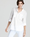 The French Connection button-down: the blank canvas for effortless style. Uptown to downtown, playdates to cocktails--this effortless piece travels through your schedule with easy chic and endless versatility.